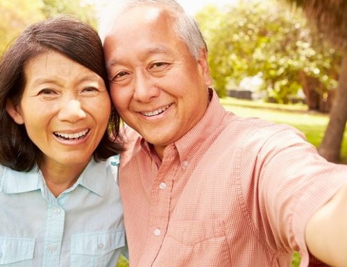Senior,Asian,Couple,Taking,Selfie,In,Park,Together Senior,Asian,Couple,Taking,Selfie,In,Park,Together